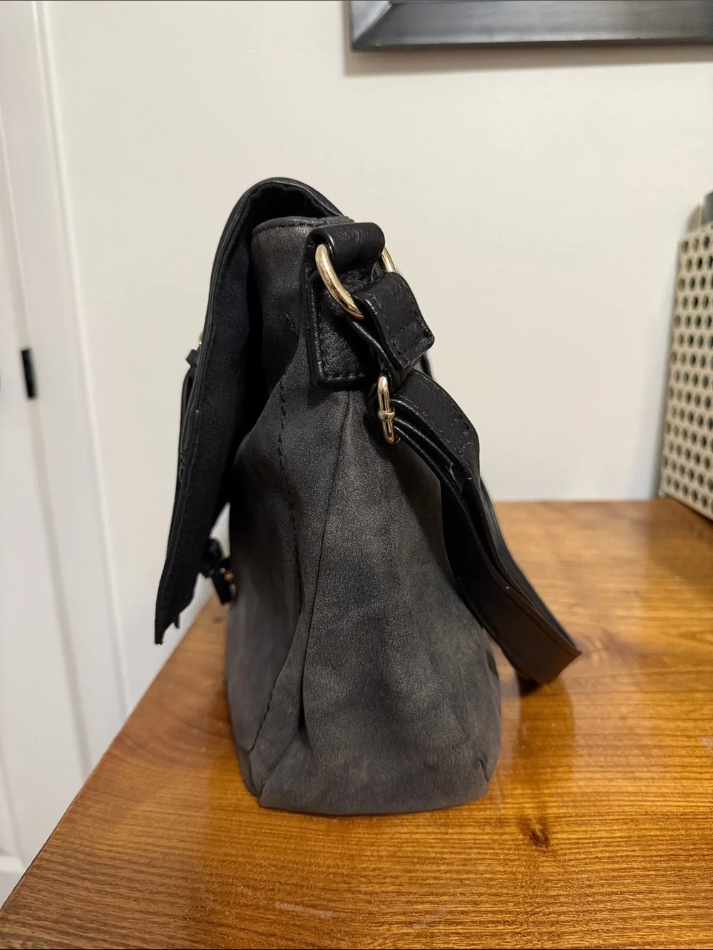 Black Women's Leather Messenger Bag with Gold Hardware